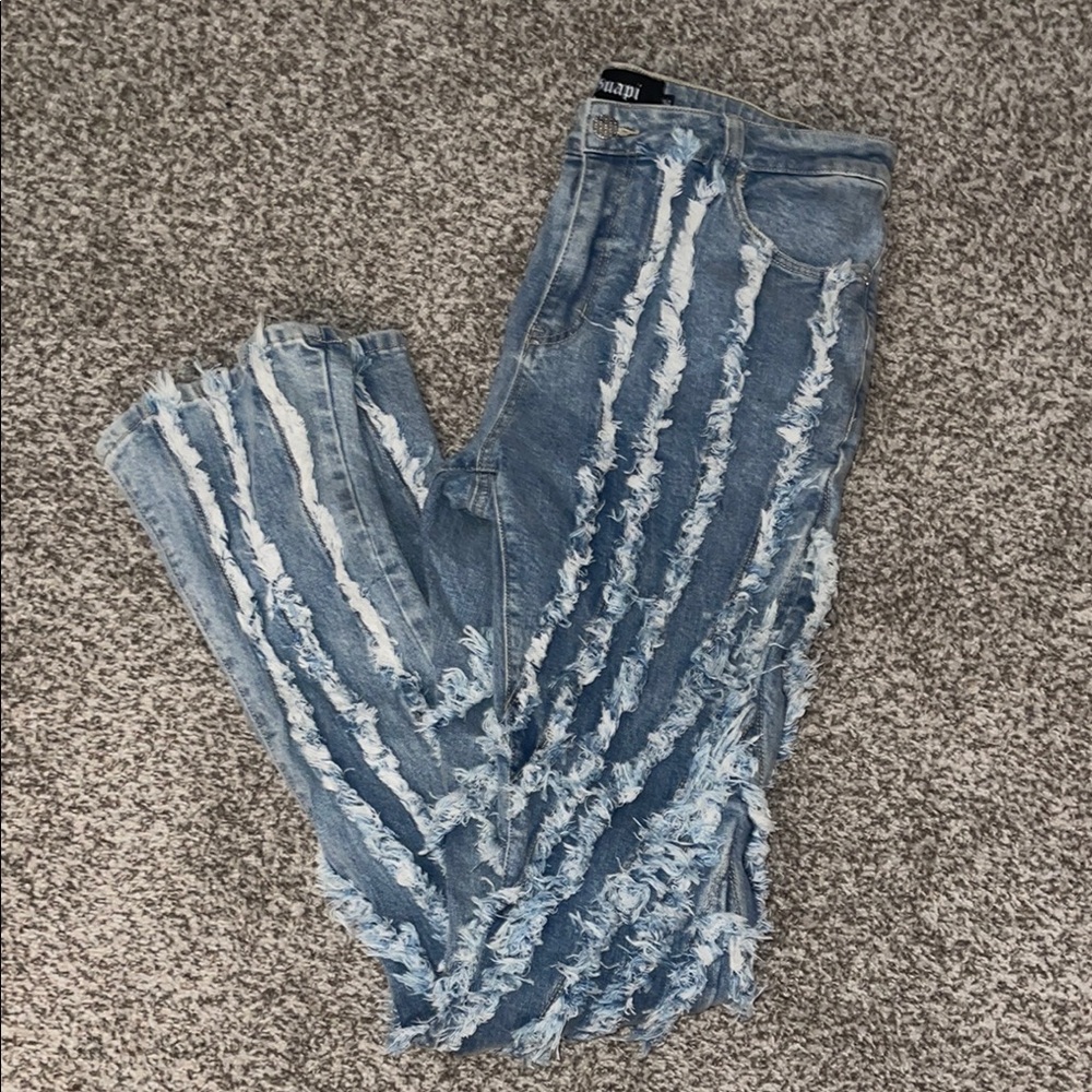 Guapi Distressed Stacked Blue Jeans